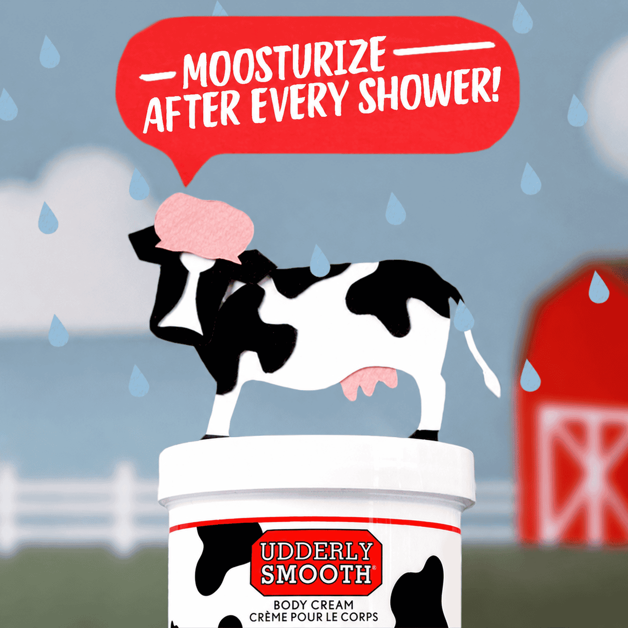Illustrated cow standing on Udderly Smooth Canadian Body Cream with the words Moosturize after every shower.